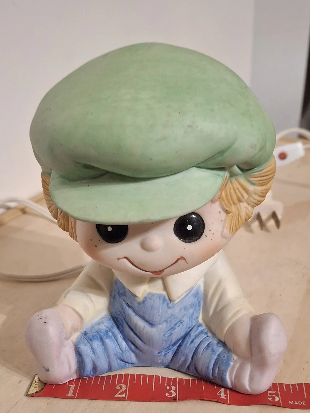 Vintage ceramic Interpur boy night light, green cap, blue overalls, works great